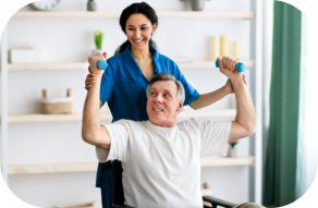 Caretaker caring an elderly man to exercise