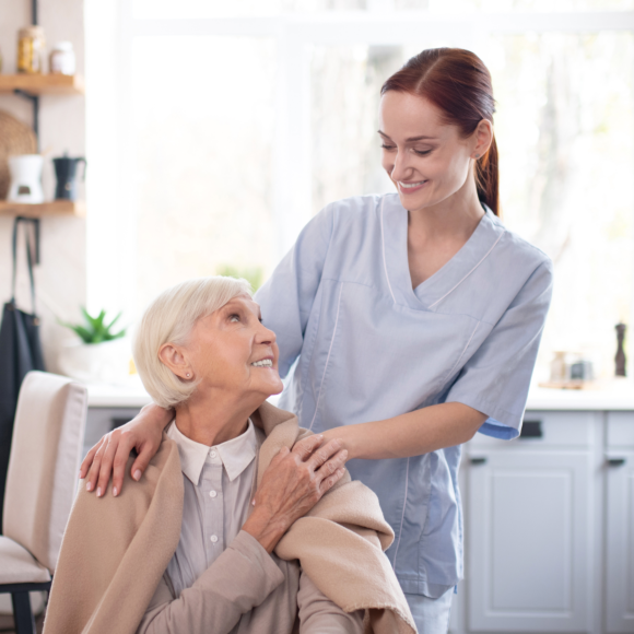 caretaker caring an elderly woman