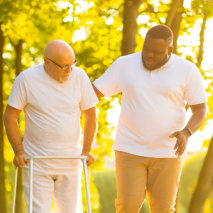 Caretaker caring an elderly man