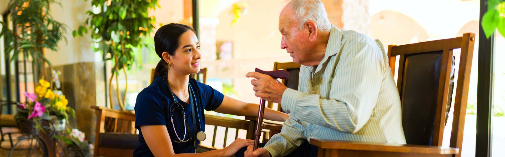 Caretaker caring an elderly man